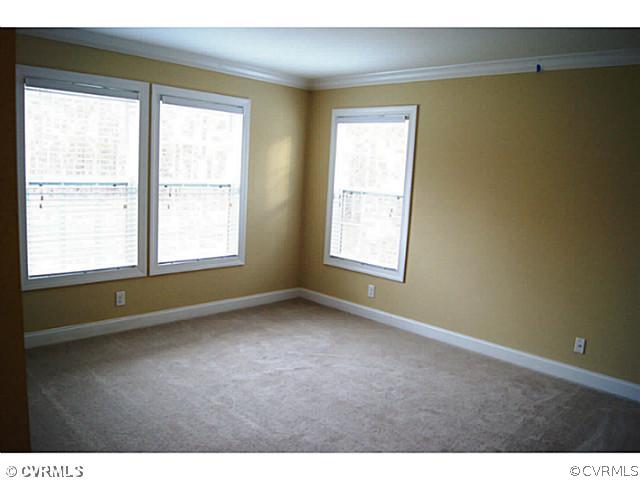 13700 Cedar Creek Road Chesterfield, VA 23838 - Photo 11 of 21 a view of an empty room with a window