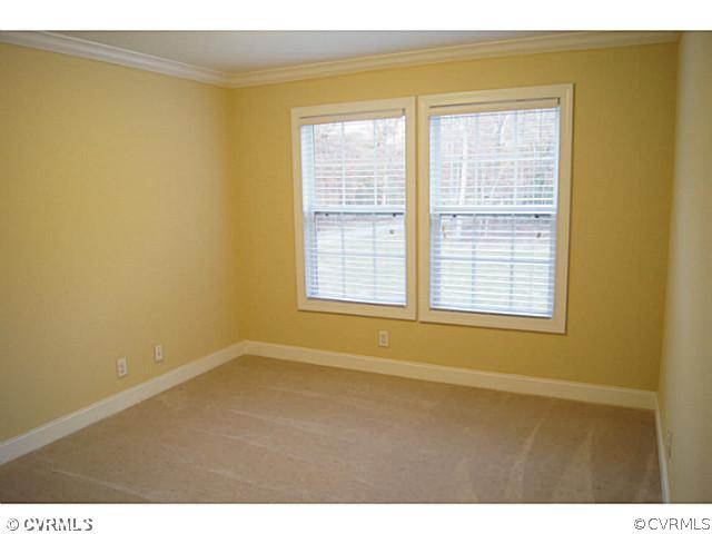 13700 Cedar Creek Road Chesterfield, VA 23838 - Photo 13 of 21 a view of an empty room with a window