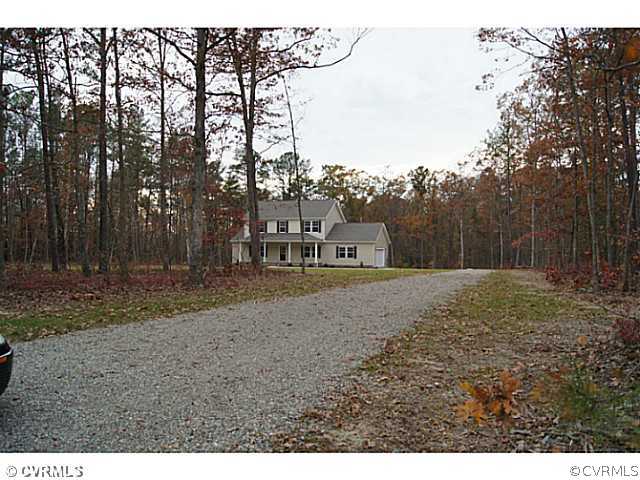 13700 Cedar Creek Road Chesterfield, VA 23838 - Photo 19 of 21 a view of a yard with wooden fence