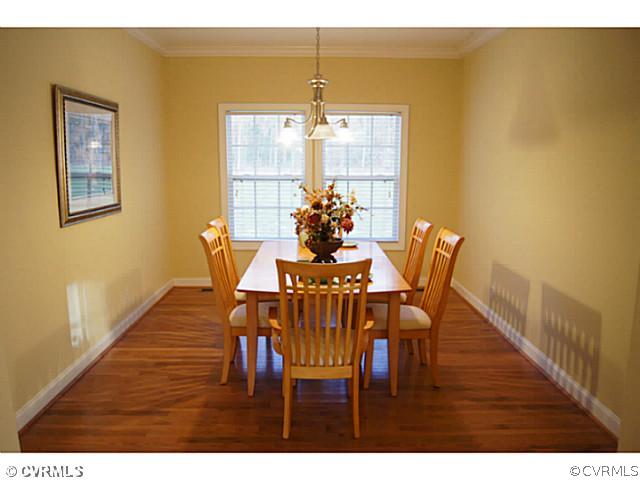 13700 Cedar Creek Road Chesterfield, VA 23838 - Photo 3 of 21 a view of a dining room with furniture and wooden floor