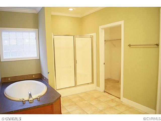 13700 Cedar Creek Road Chesterfield, VA 23838 - Photo 9 of 21 a bathroom with a sink mirror and a shower