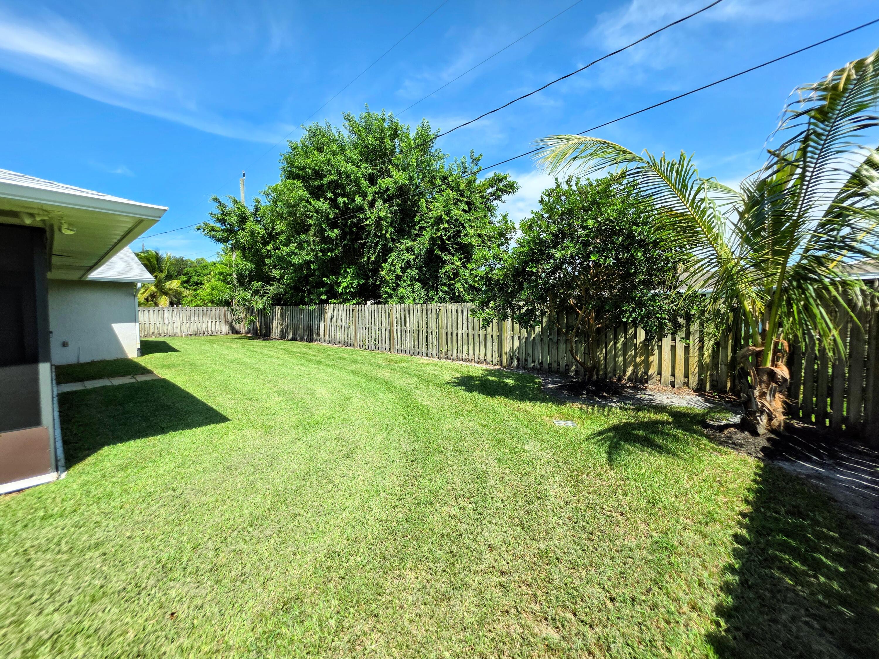 1602 Southeast Holiday Road Port St. Lucie, FL 34952 - Photo 16 of 18 Fenced Yard