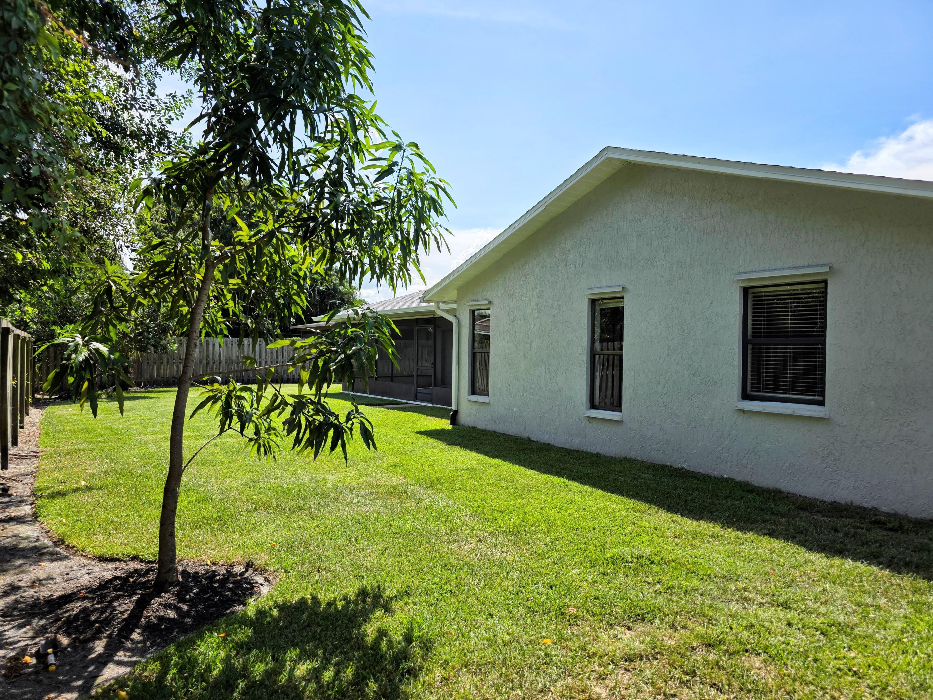 1602 Southeast Holiday Road Port St. Lucie, FL 34952 - Photo 18 of 18 Beautiful Yard