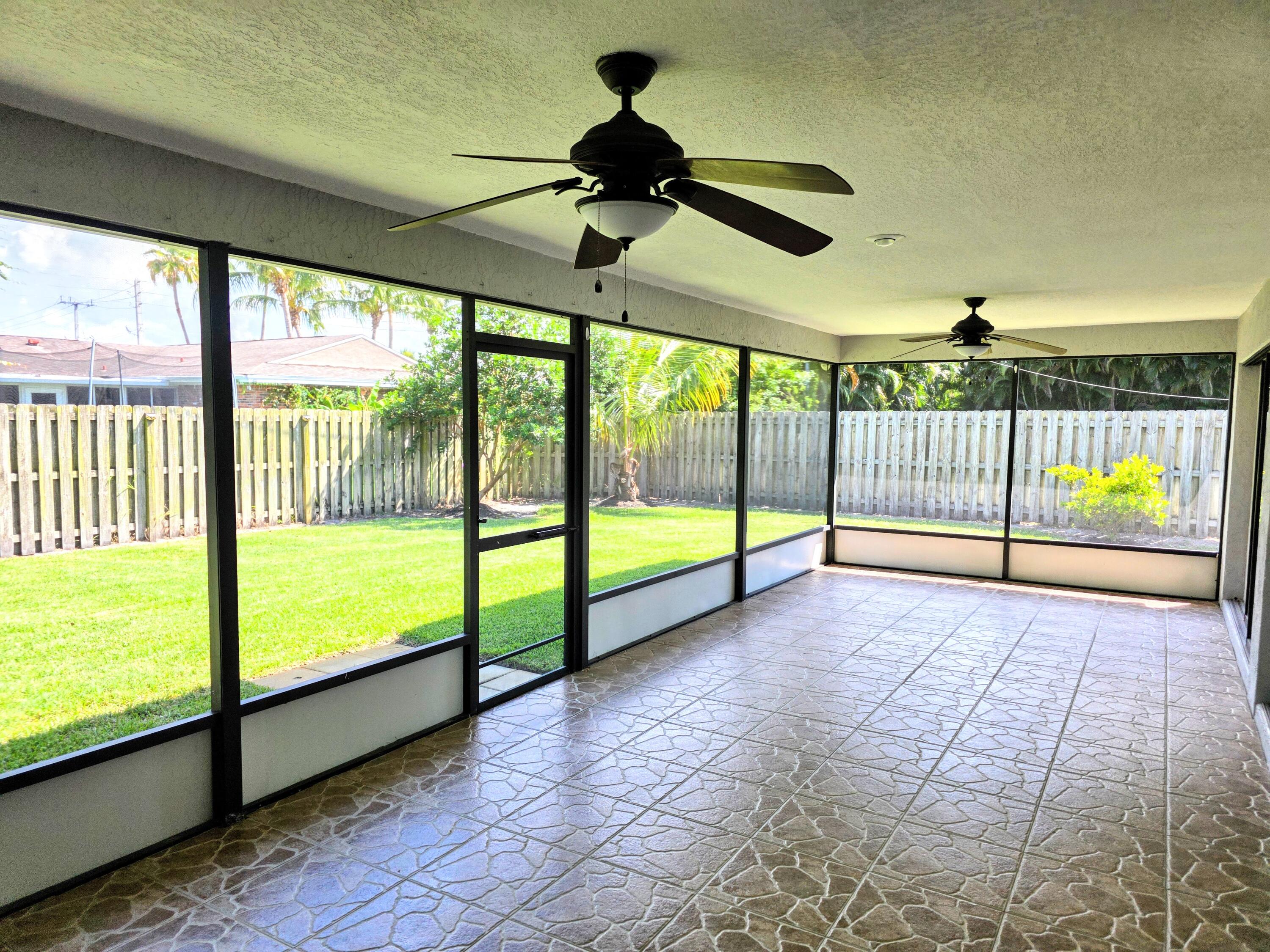 1602 Southeast Holiday Road Port St. Lucie, FL 34952 - Photo 8 of 18 Peek out the Slider
