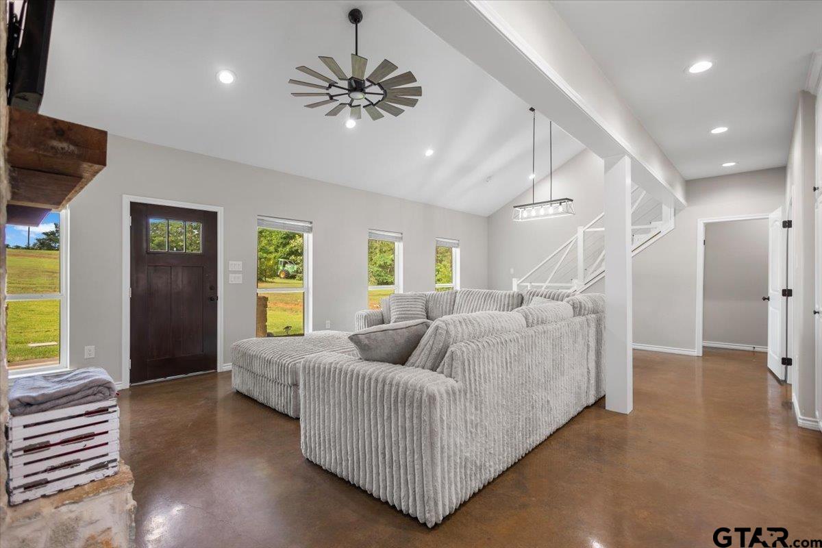 9235 Farm To Market Road 851 Rusk, TX 75785 - Photo 6 of 47 a living room with furniture and a chandelier