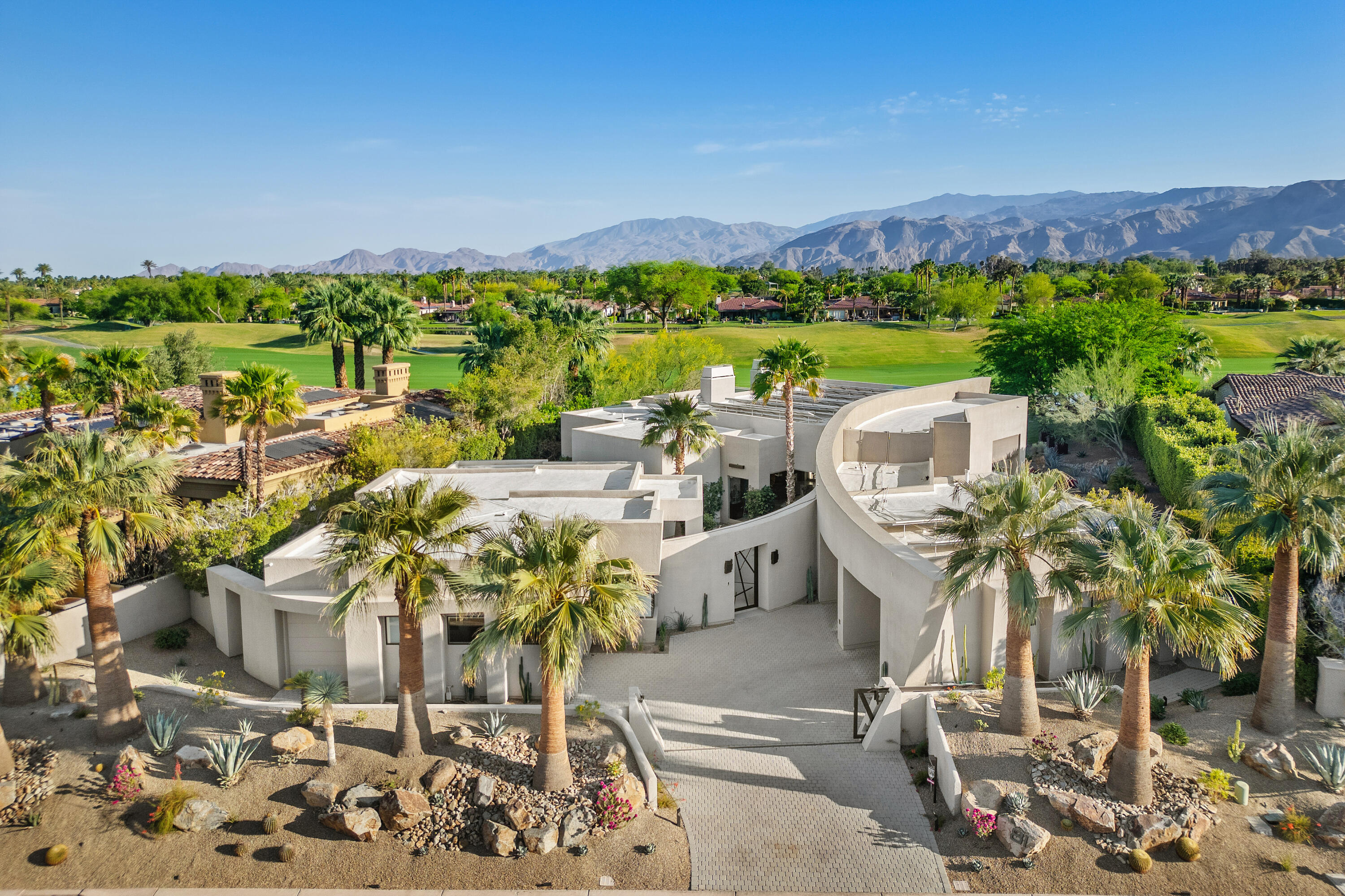 81 Royal St Georges Way Rancho Mirage, CA 92270 - Photo 5 of 59 a view of a city with lawn chairs