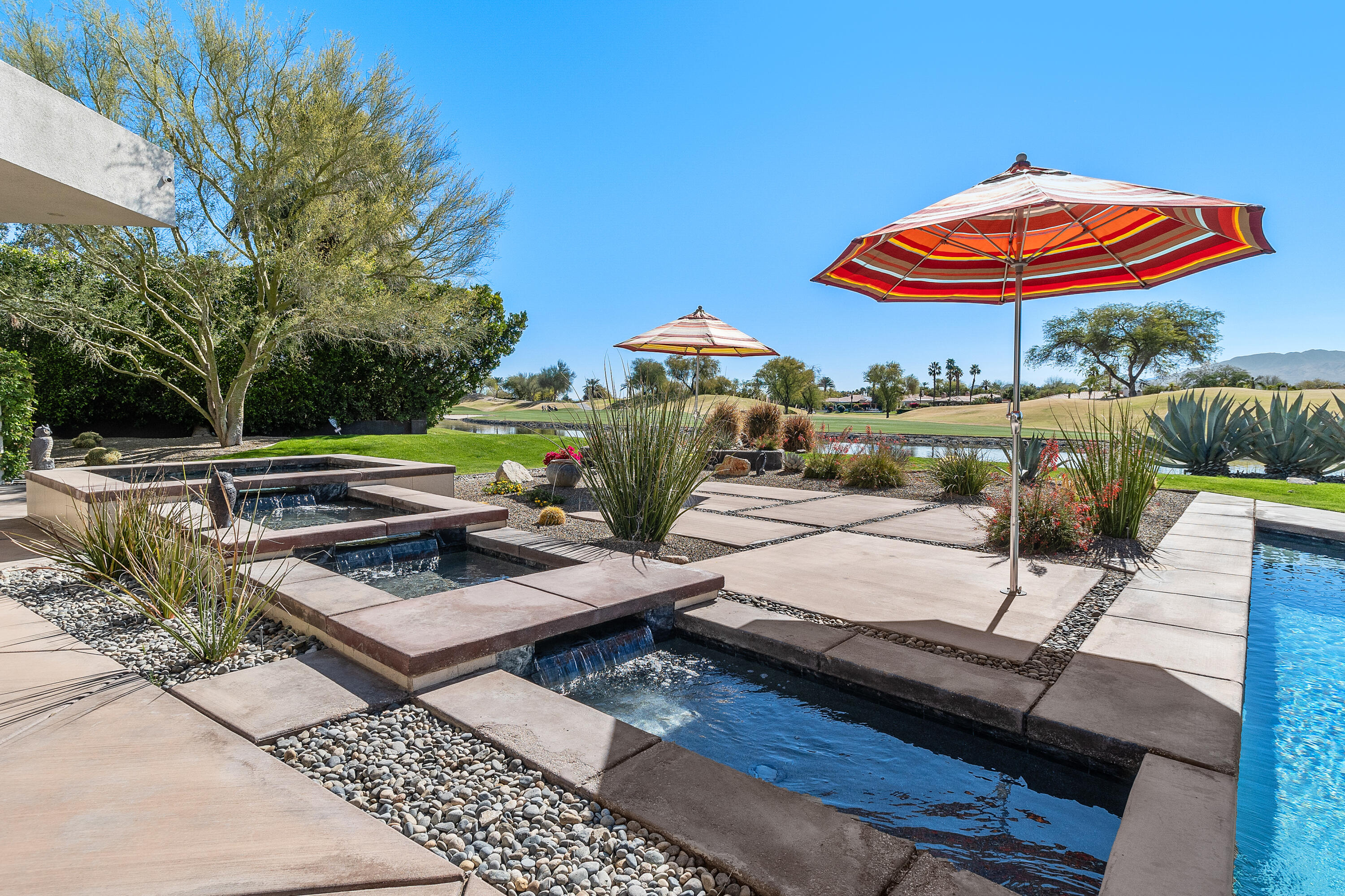 81 Royal St Georges Way Rancho Mirage, CA 92270 - Photo 7 of 59 a outdoor space with patio lots of furniture
