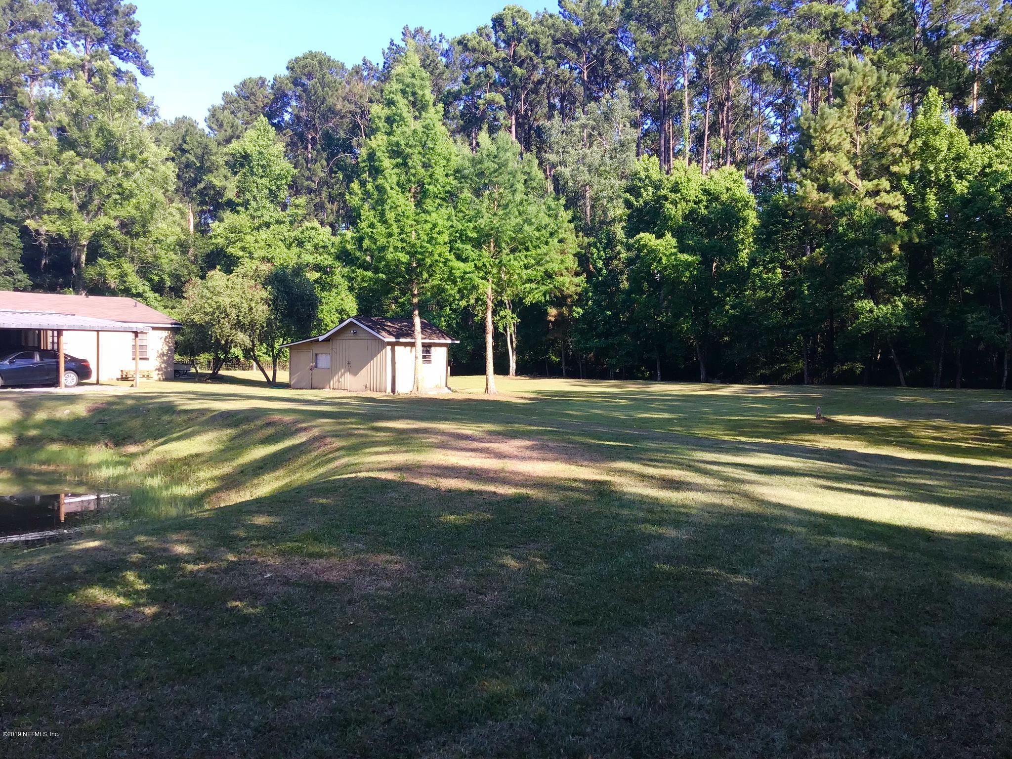 45108 R Jones Road Callahan, FL 32011 - Photo 3 of 20 a view of a house with a big yard