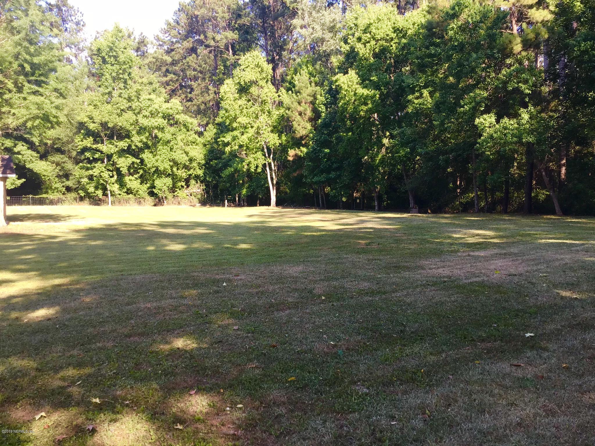 45108 R Jones Road Callahan, FL 32011 - Photo 5 of 20 a view of a big yard with trees