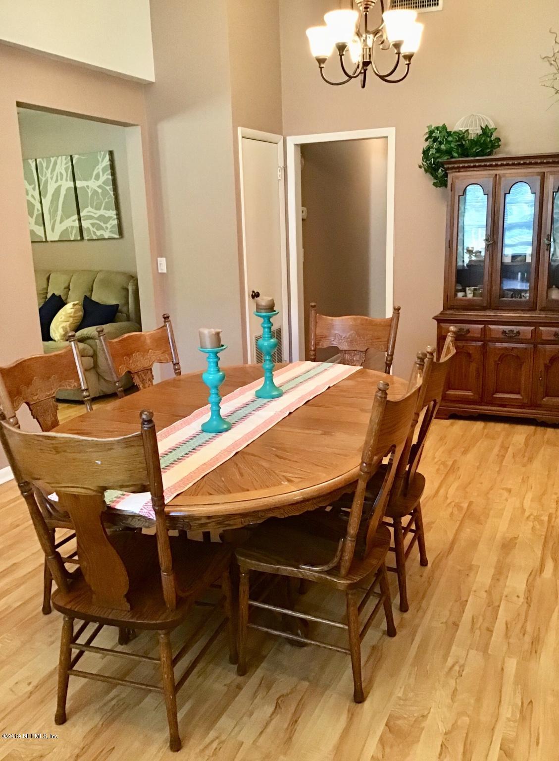 45108 R Jones Road Callahan, FL 32011 - Photo 9 of 20 a dining room with furniture and window