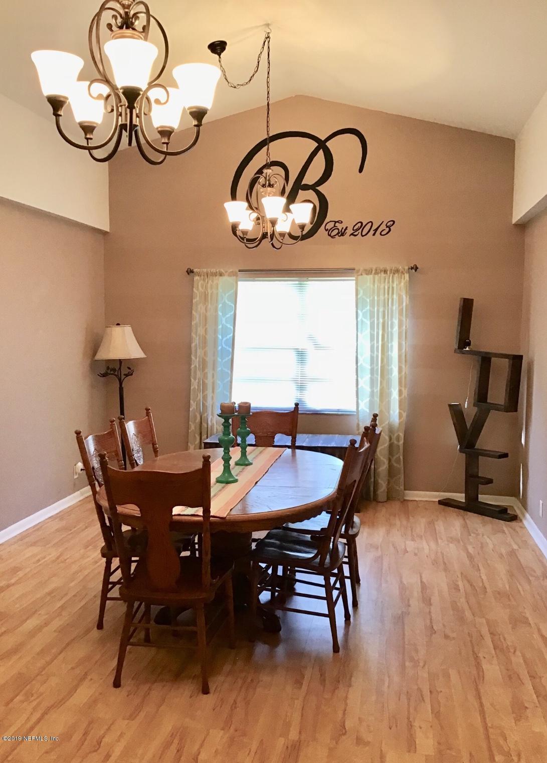45108 R Jones Road Callahan, FL 32011 - Photo 10 of 20 a view of a dining room and livingroom
