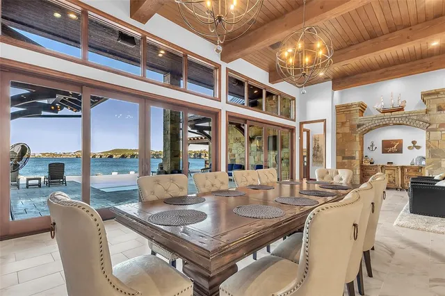 a media room with lots of chairs and a projector screen