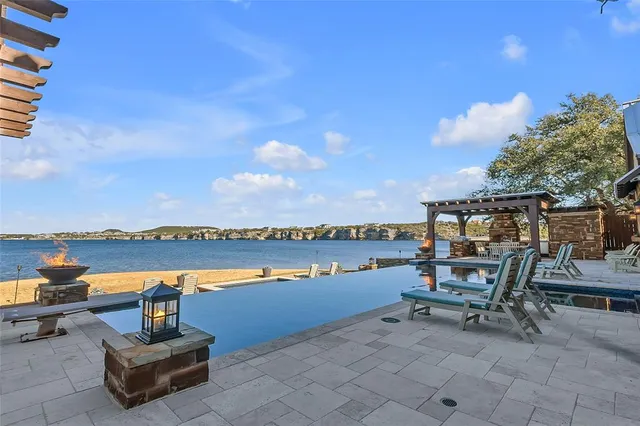 a dining room with furniture and a fireplace