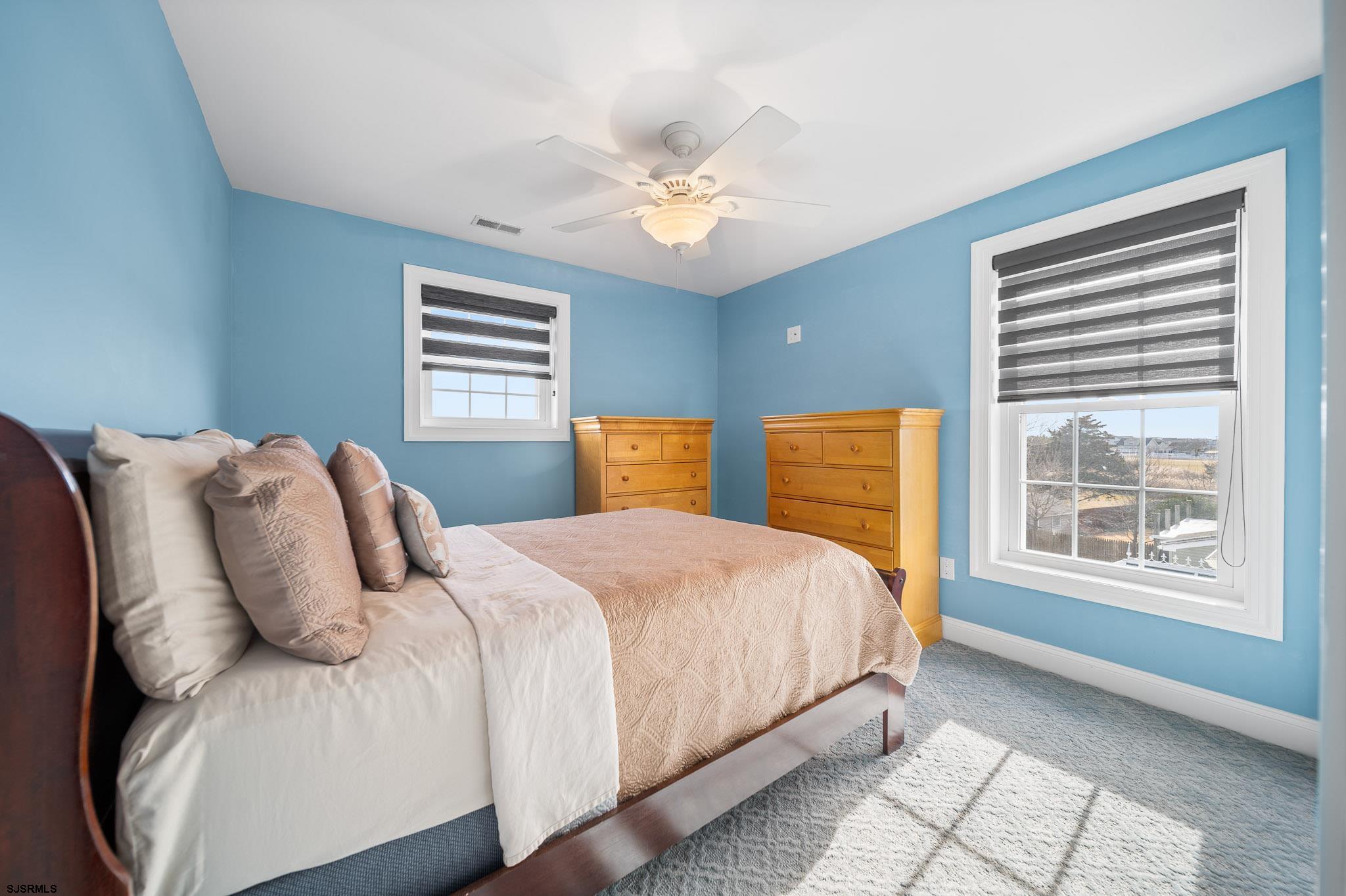 9 Cummings Place Brigantine, NJ 08203 - Photo 27 of 39 a bedroom with a large bed and a window