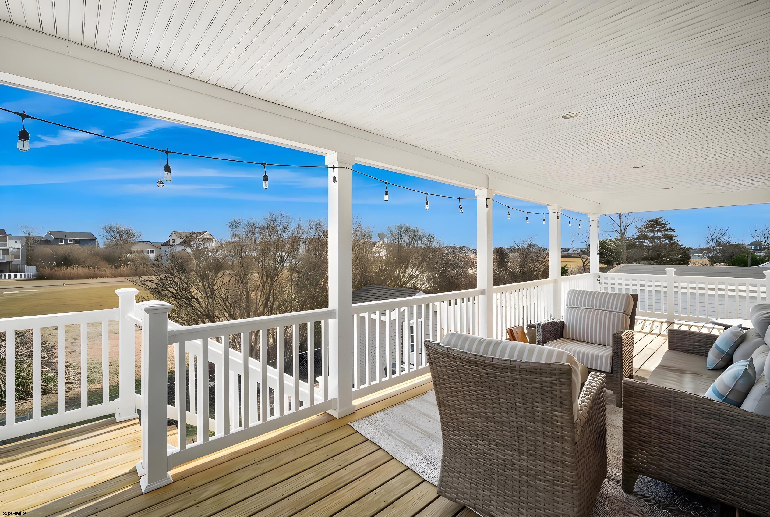 9 Cummings Place Brigantine, NJ 08203 - Photo 5 of 39 a balcony with furniture