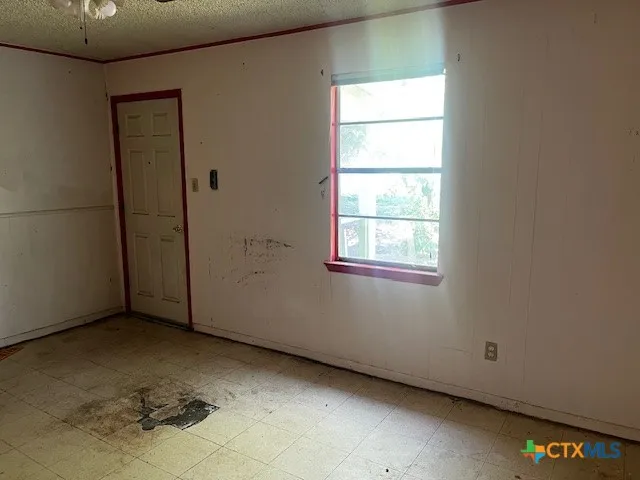 an empty room with a window