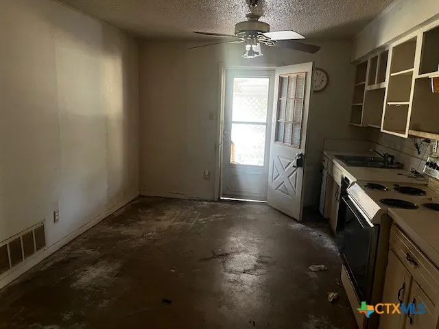 an empty room with windows