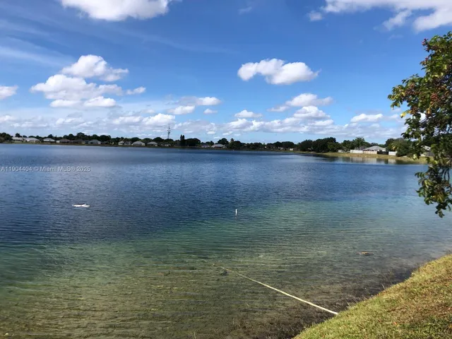 a bathroom with a sink a toilet and bathtub