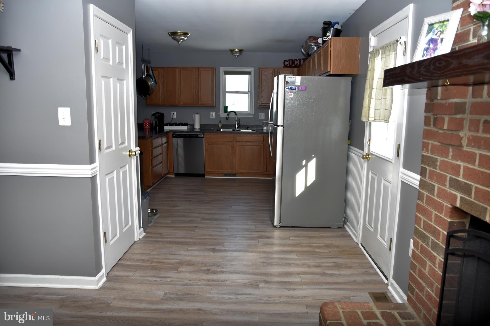 10043 Meetze Road Midland, VA 22728 - Photo 12 of 39 basement door on left, side door on right, kitchen