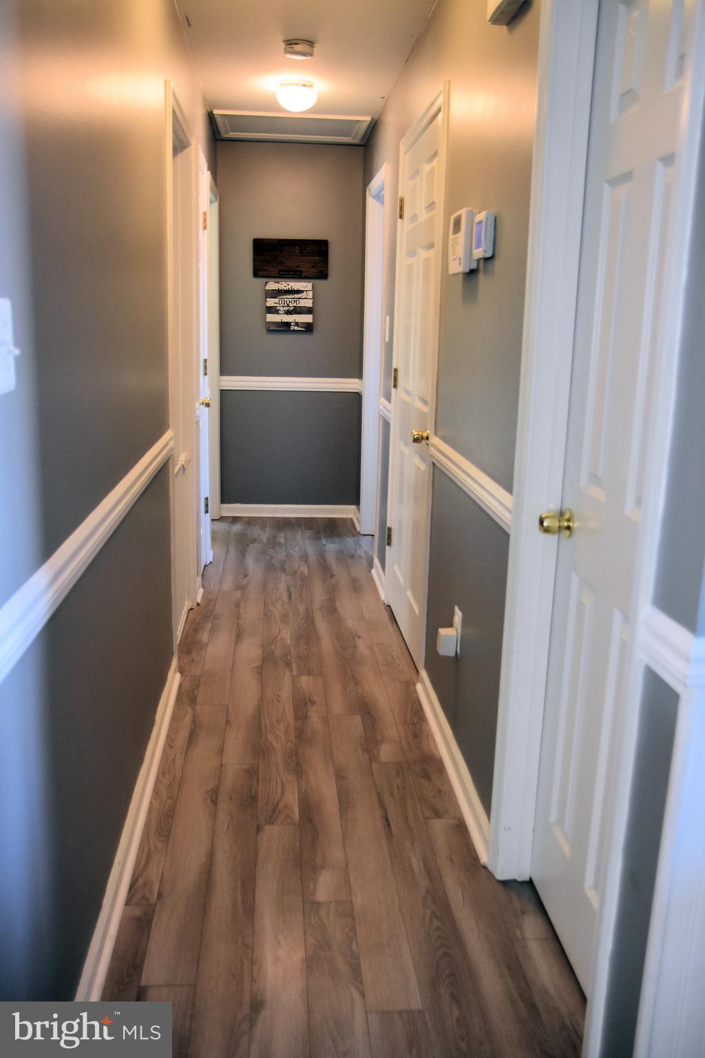 10043 Meetze Road Midland, VA 22728 - Photo 13 of 39 hallway to bedrooms just left of dining area
