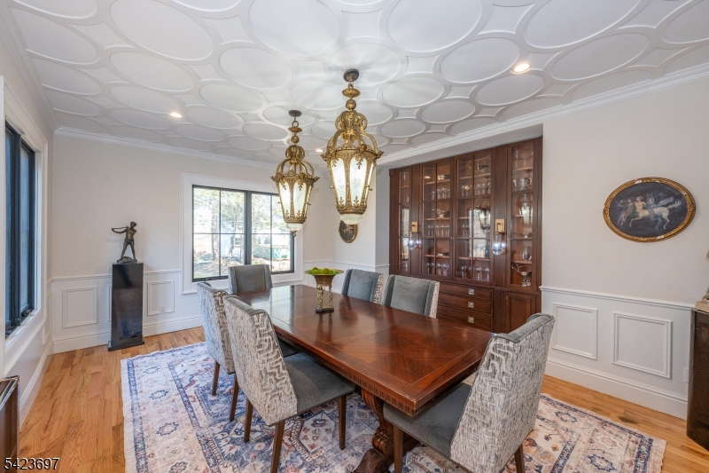 45 Village Road New Vernon, NJ 07976 - Photo 16 of 49 a view of a dining room with furniture