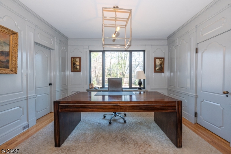 45 Village Road New Vernon, NJ 07976 - Photo 18 of 49 a room with a table chairs and windows