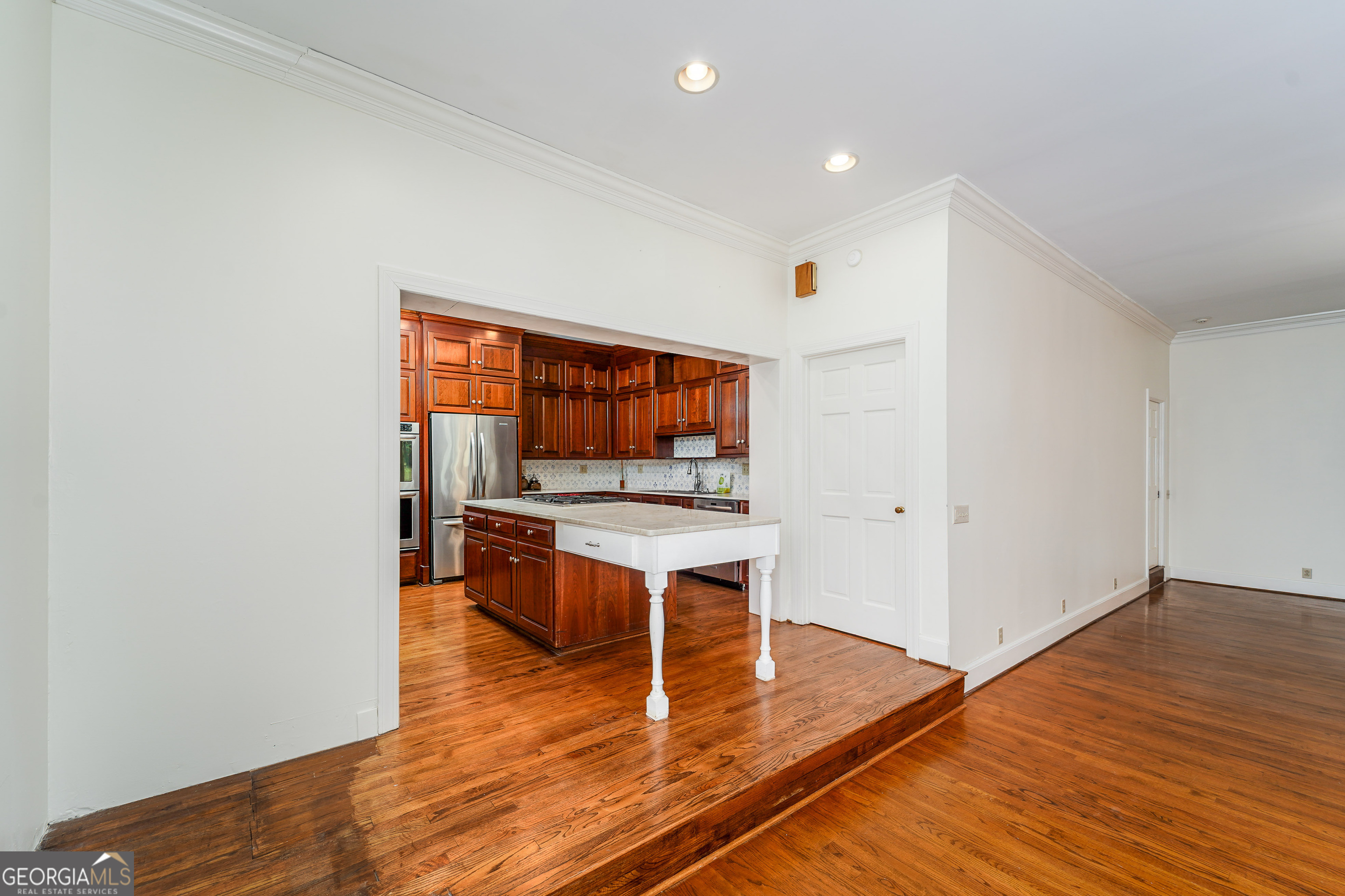 1602 Ward St Extension West Douglas, GA 31533 - Photo 27 of 70 a room with wooden floor and furniture