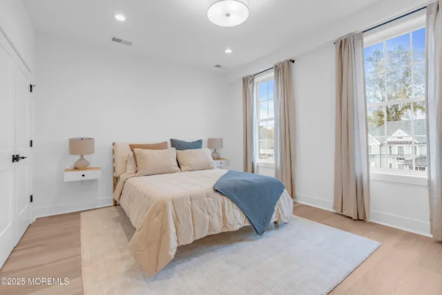 a bed room with a bed and a couch