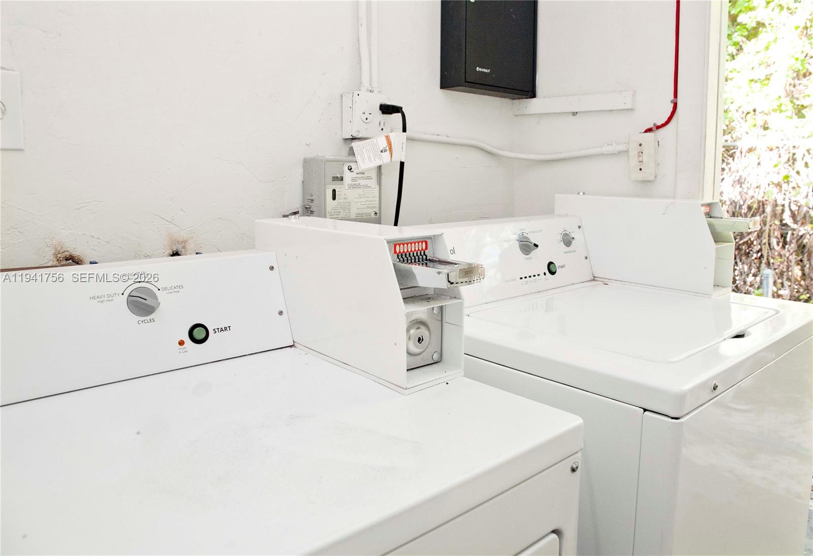 2206 Fillmore Street, Unit 3 Hollywood, FL 33020 - Photo 11 of 12 a utility room with dryer and washer