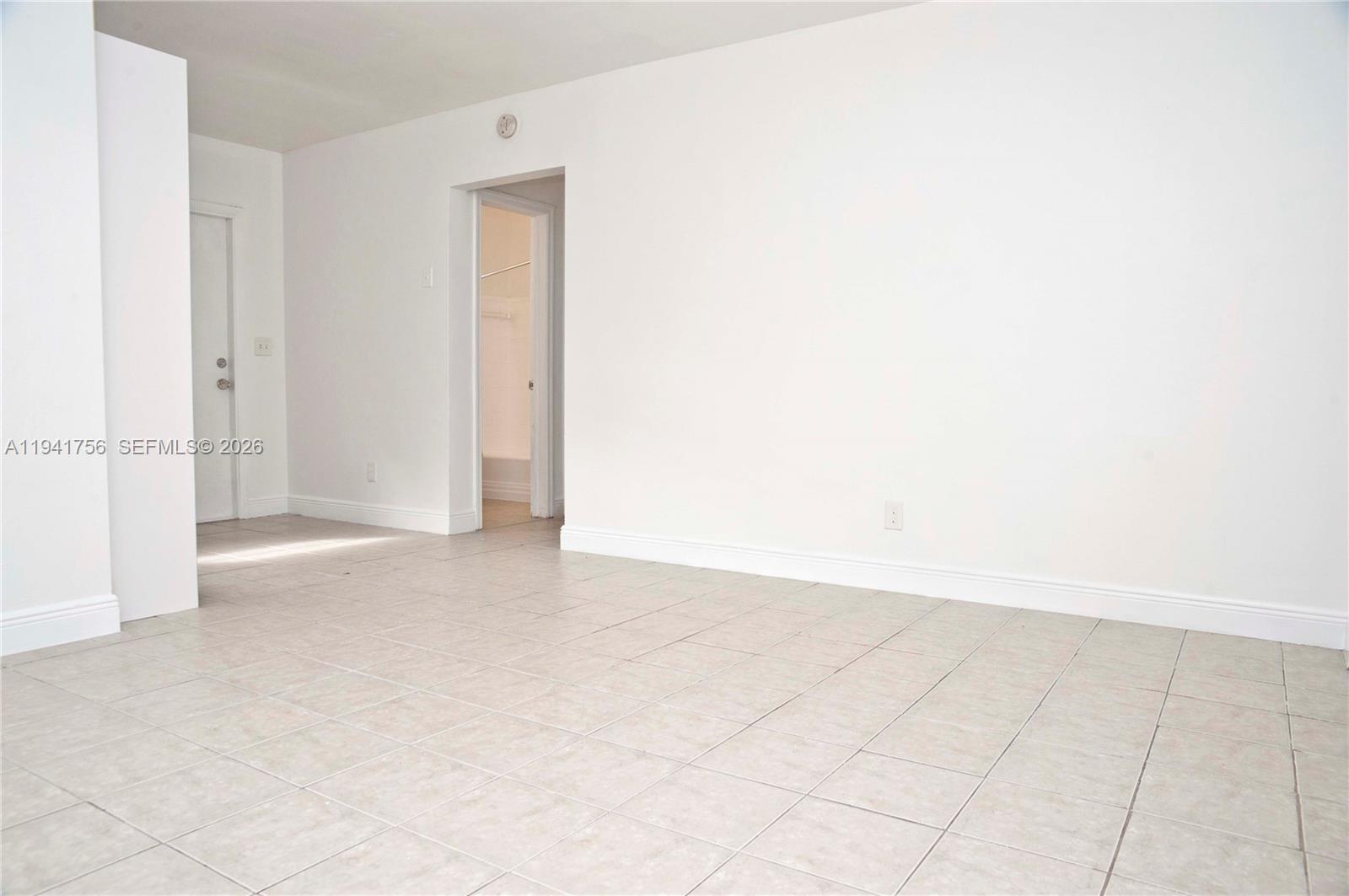 2206 Fillmore Street, Unit 3 Hollywood, FL 33020 - Photo 8 of 12 a view of an empty room