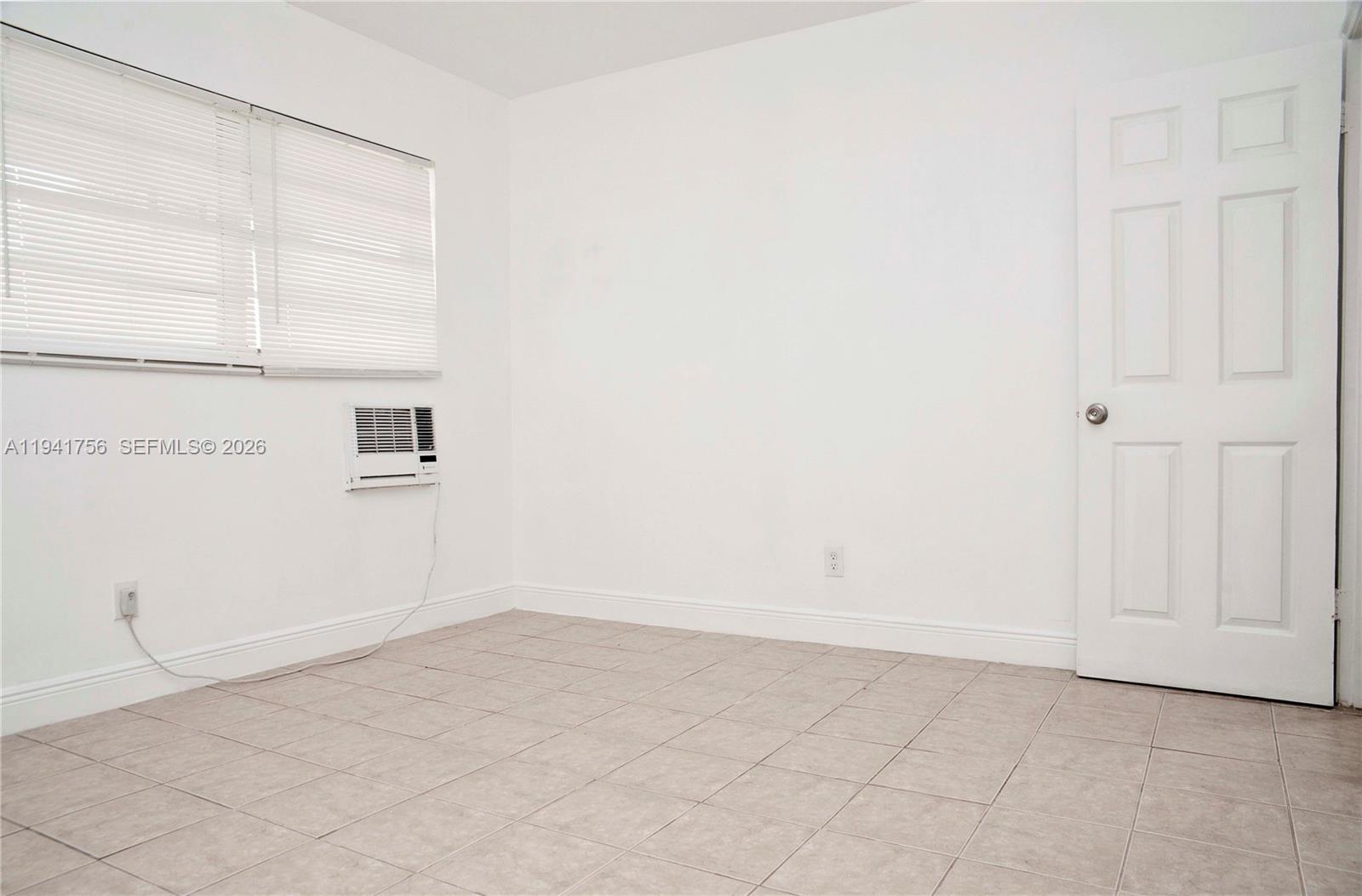 2206 Fillmore Street, Unit 3 Hollywood, FL 33020 - Photo 10 of 12 an empty room with cabinet