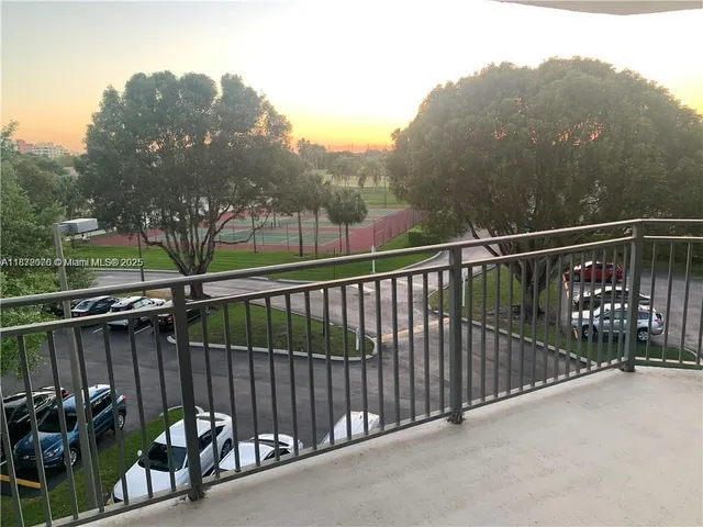a view of a street from a balcony