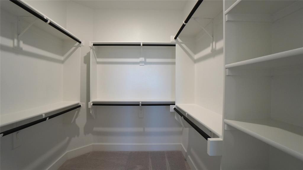 1374 Chisos Way Forney, TX 75126 - Photo 17 of 25 a view of walk in closet