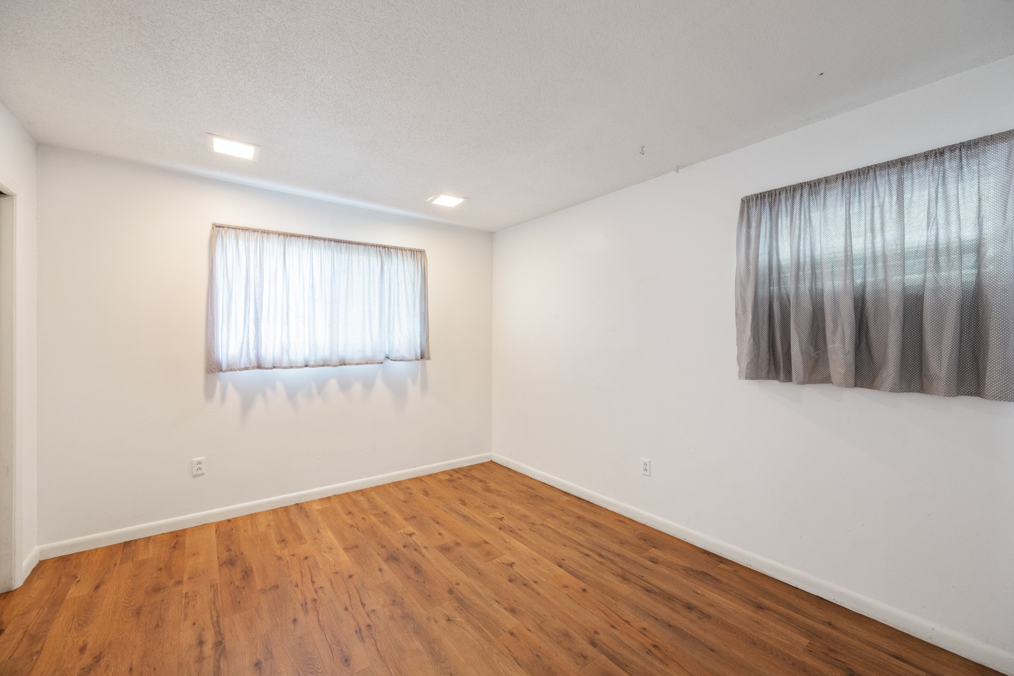 53 Elm Street Decaturville, TN 38329 - Photo 26 of 44 a view of empty room with wooden floor