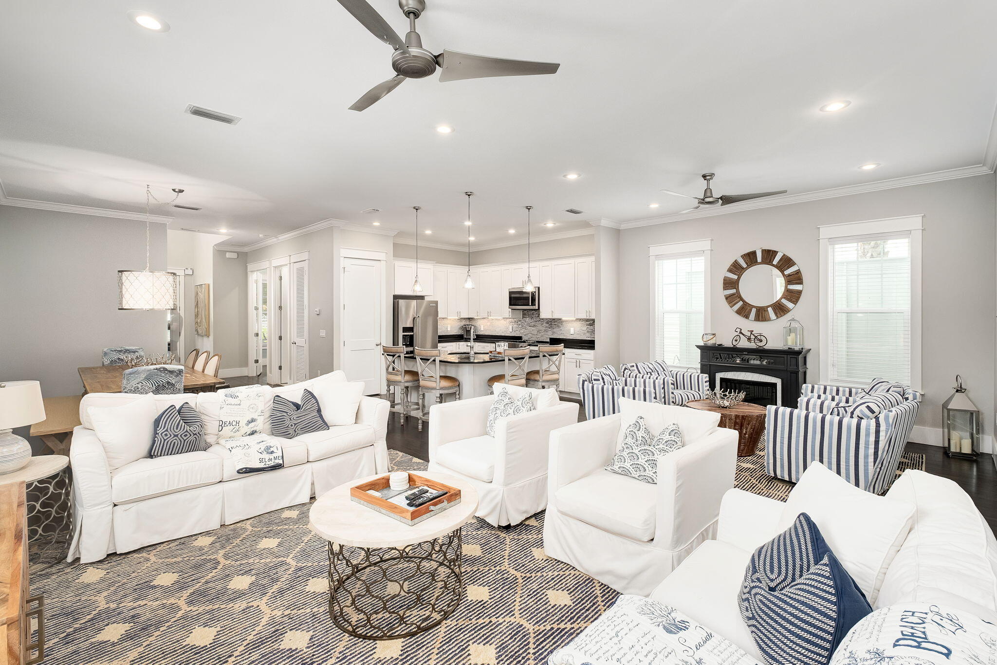 2846 South County Highway 395 Santa Rosa Beach, FL 32459 - Photo 10 of 19 a living room with furniture kitchen view and a chandelier