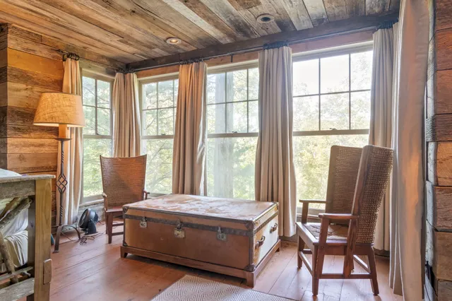 a view of a chairs and table in a patio