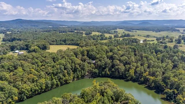 a view of a chairs on wooden deck