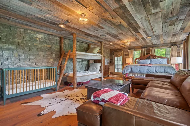 a view of a yard with large trees