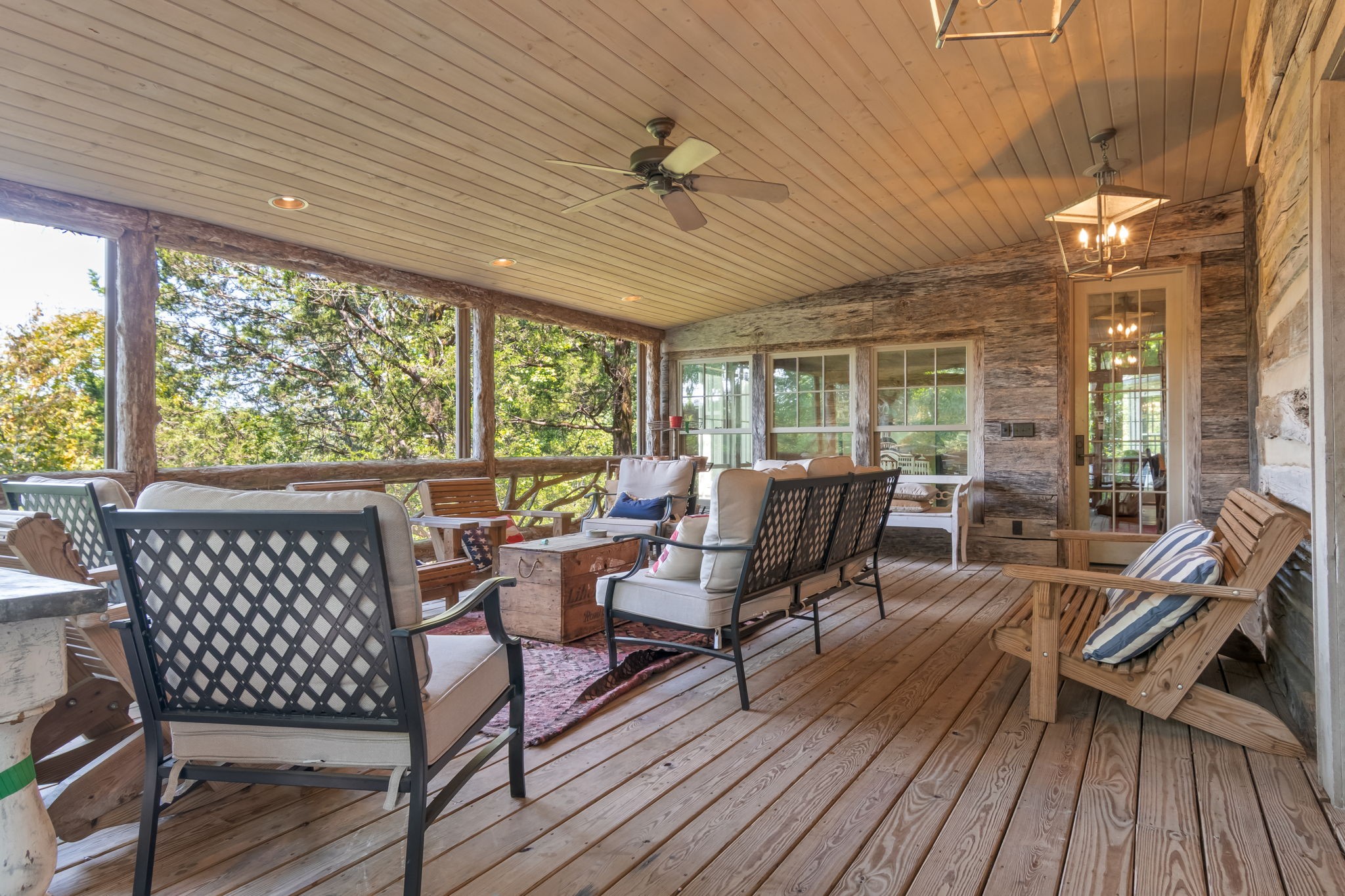 658 Moore Road Doyle, TN 38559 - Photo 38 of 92 a living room with furniture a large window and wooden floor