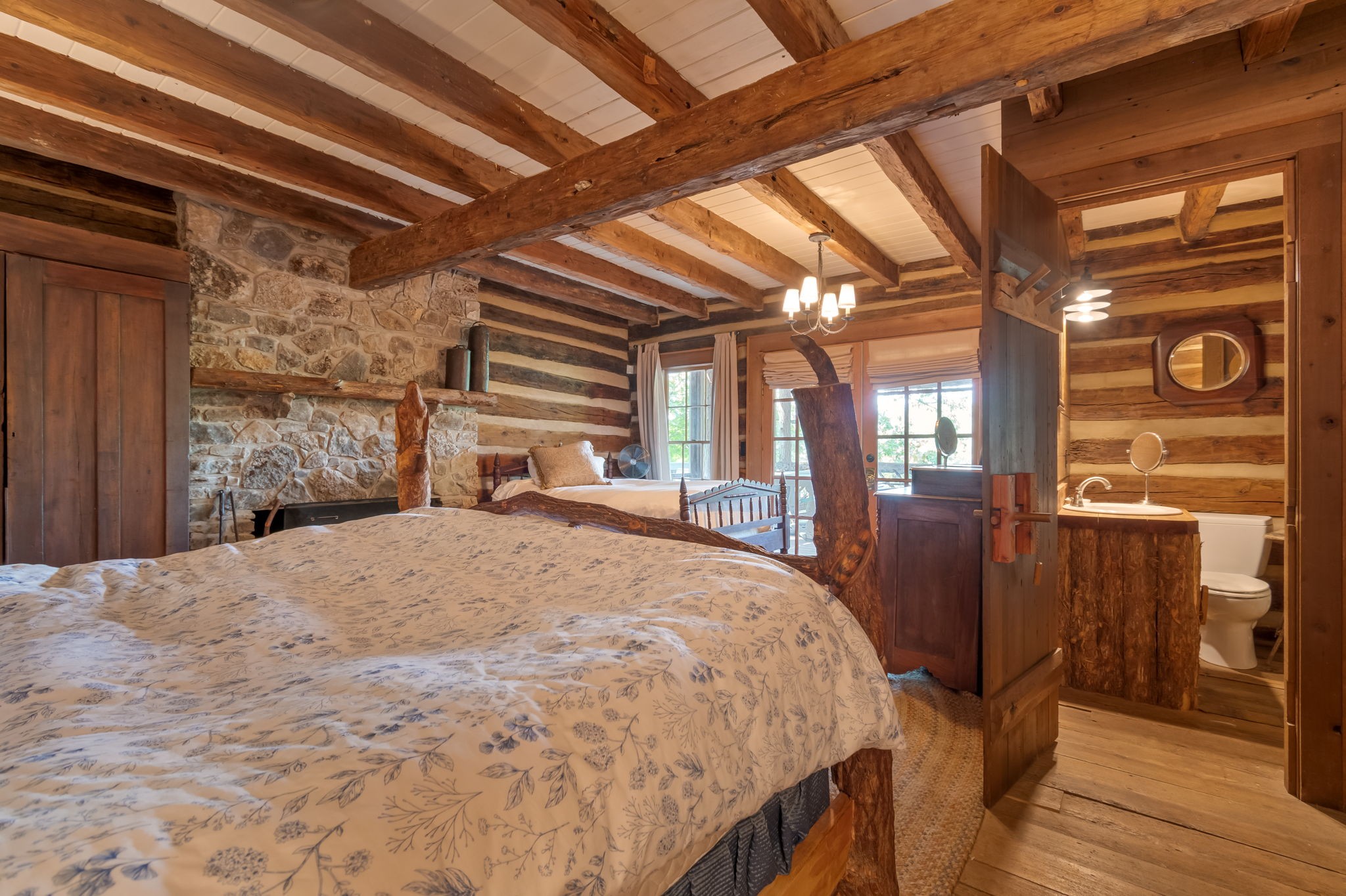 658 Moore Road Doyle, TN 38559 - Photo 40 of 92 a bedroom with a bed and wooden floor