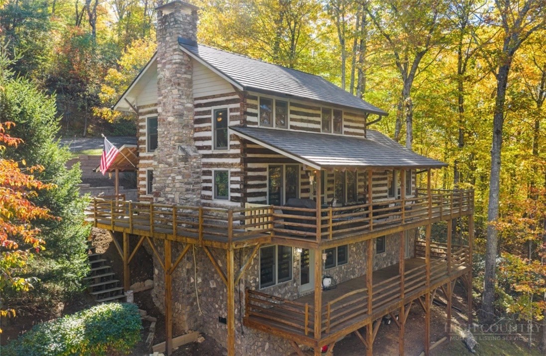 376 Yellow Bear Road Todd, NC 28684 - Photo 2 of 29 a front view of a house with a tree