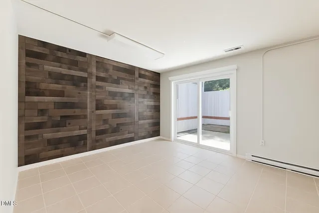 a en suite bathroom with a sink a mirror and shower
