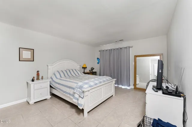 a front view of a house with a yard and porch