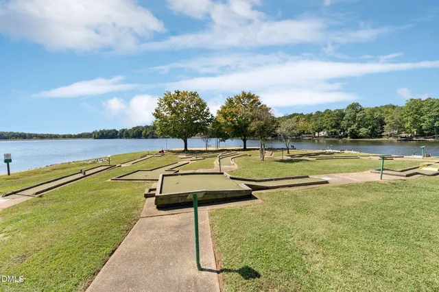 a view of a lake with a big yard