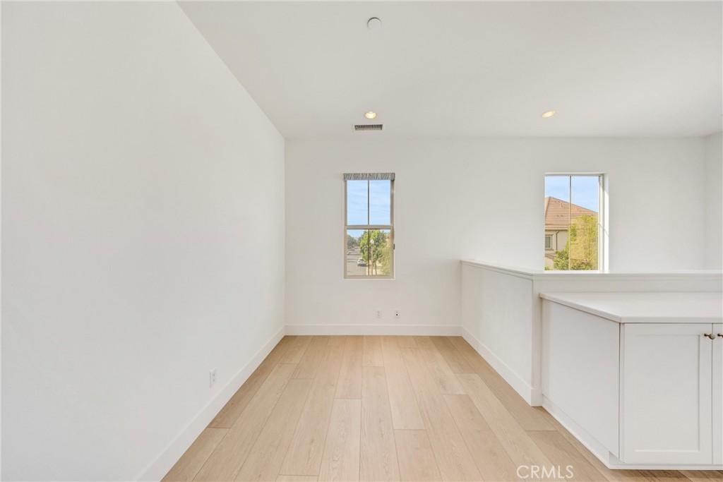 107 Hanging Garden Irvine, CA 92620 - Photo 15 of 26 a view of room and window