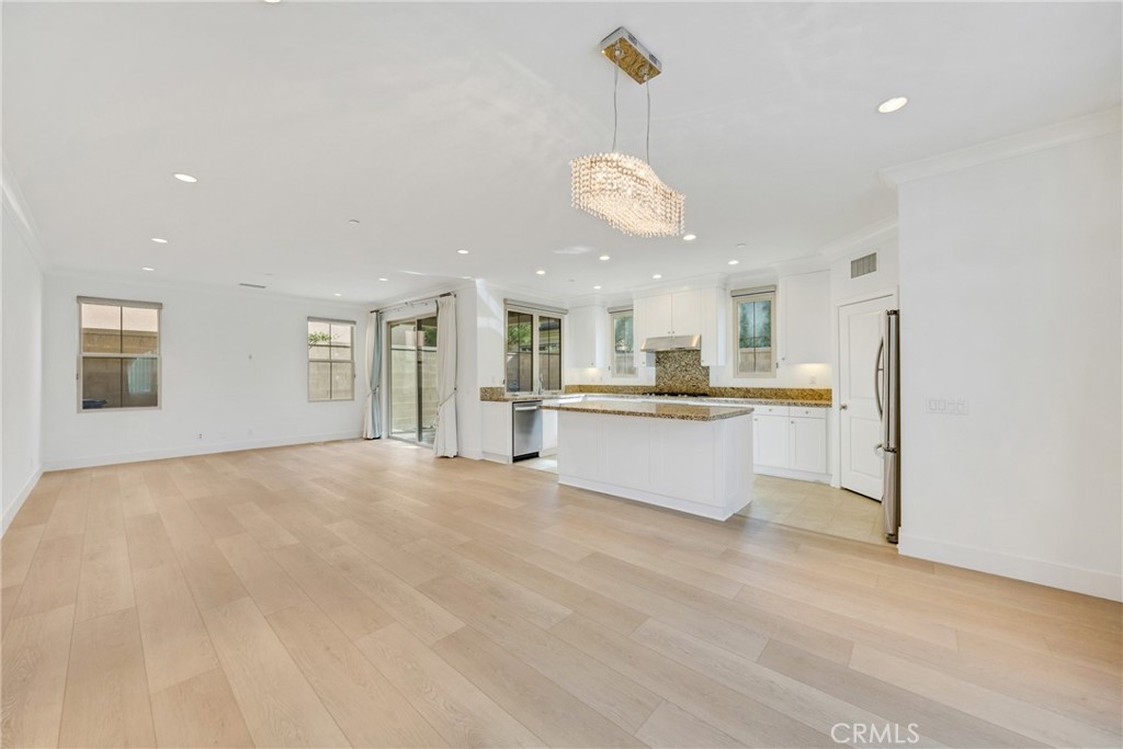 107 Hanging Garden Irvine, CA 92620 - Photo 6 of 26 a view of kitchen and windows