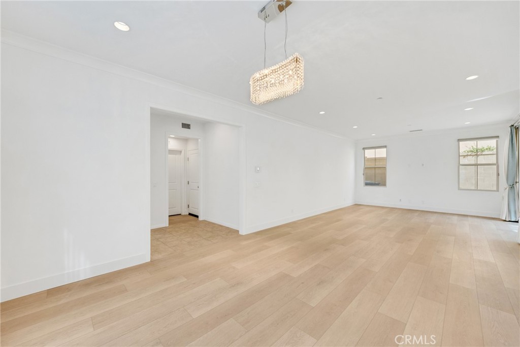 107 Hanging Garden Irvine, CA 92620 - Photo 8 of 26 a view of an empty room with a window