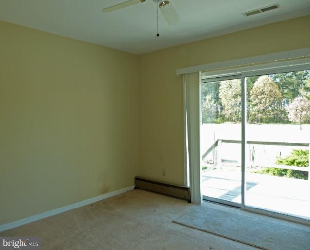 1020 Wagner Point Road Cambridge, MD 21613 - Photo 2 of 26 Sliding door onto deck