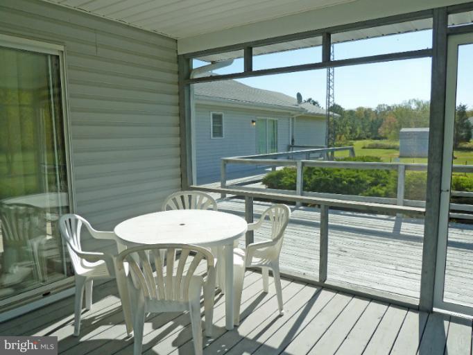 1020 Wagner Point Road Cambridge, MD 21613 - Photo 6 of 26 Screened Porch