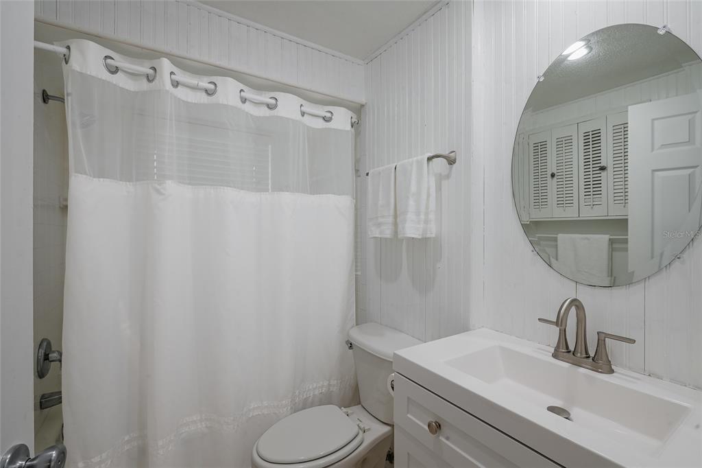 120 Maple Avenue Anna Maria, FL 34216 - Photo 20 of 39 a bathroom with a sink toilet and shower